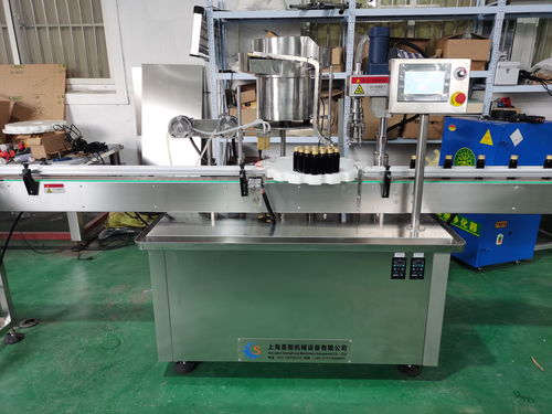 口服液灌裝軋蓋機(jī)工作原理